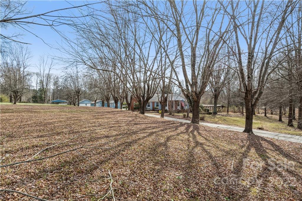 4600 Stallings Road Matthews, NC 28105 - Photo 3 of 38 a view of empty space with tree