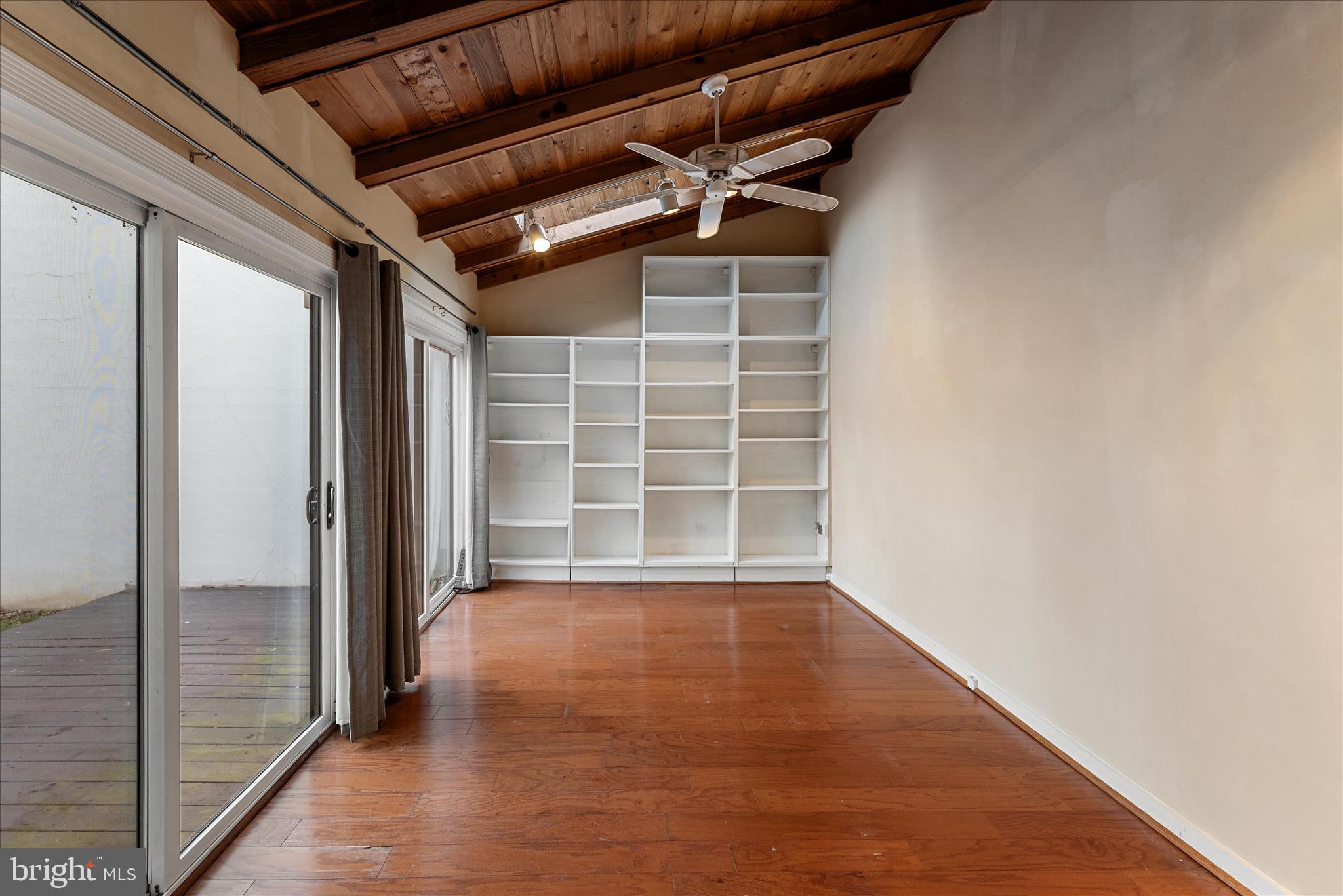 2337 Glade Bank Way Reston, VA 20191 - Photo 18 of 50 an empty room with wooden floor and windows