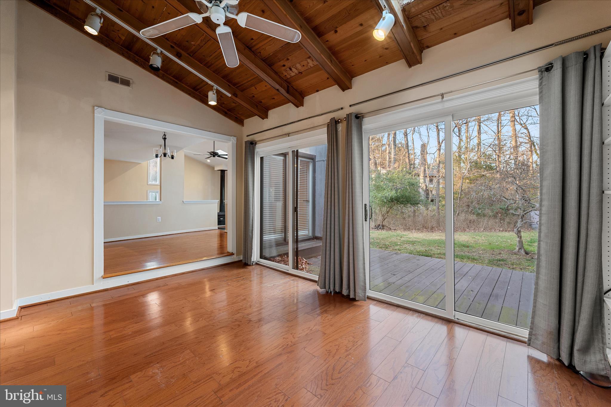 2337 Glade Bank Way Reston, VA 20191 - Photo 19 of 50 a view of an empty room with wooden floor and a window