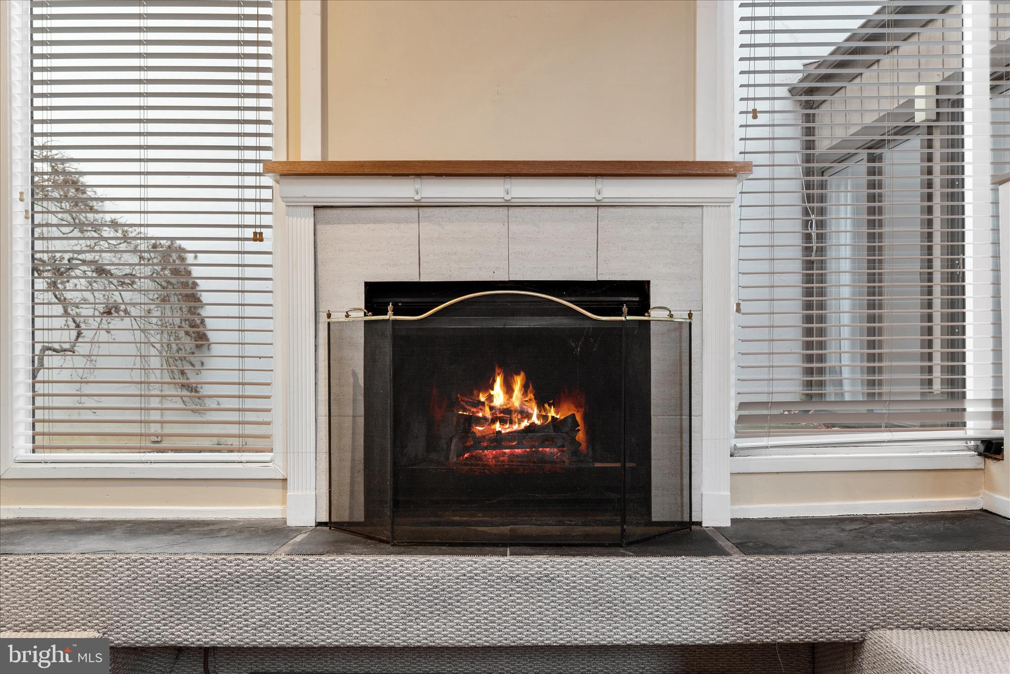 2337 Glade Bank Way Reston, VA 20191 - Photo 29 of 50 a living room with a fireplace