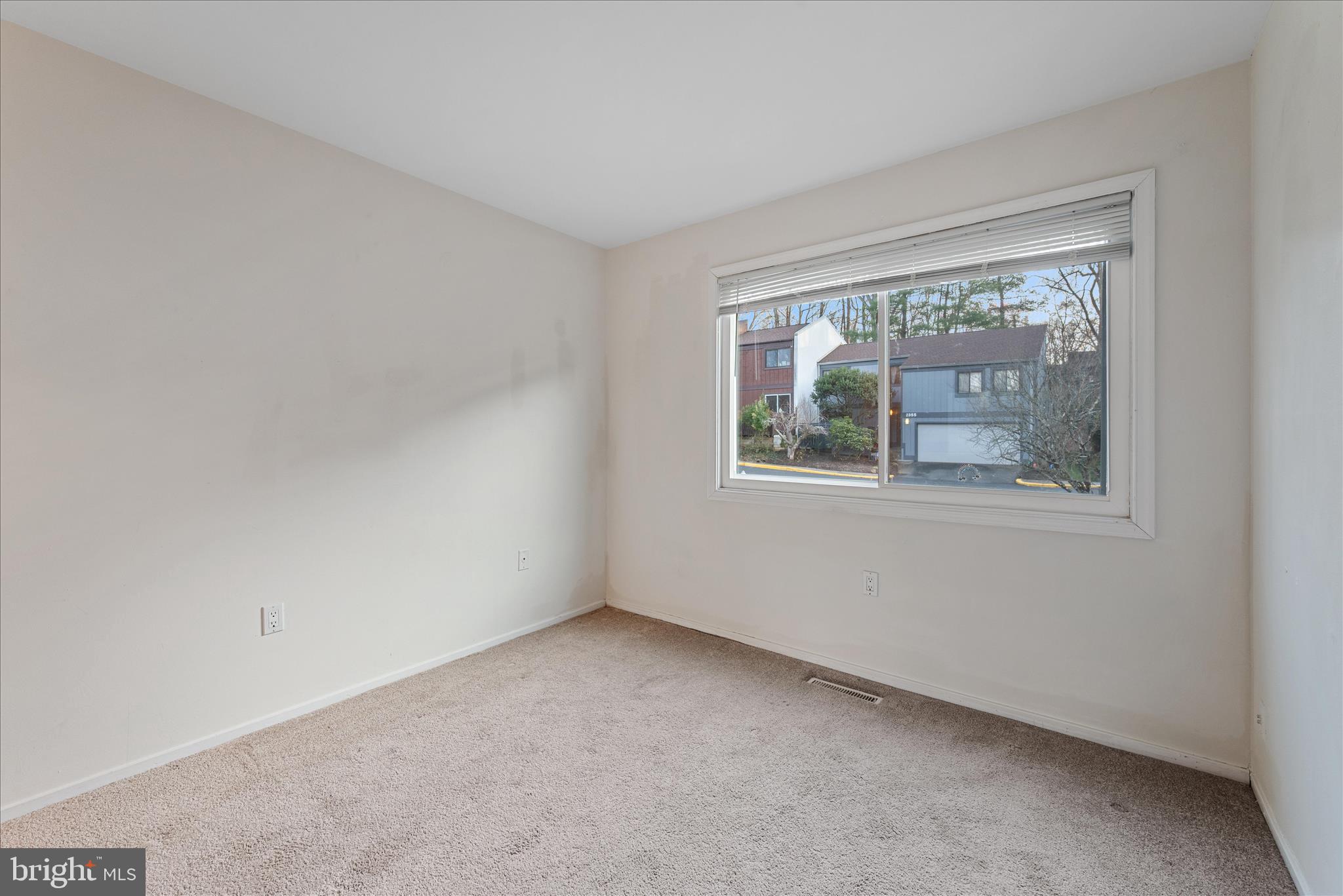 2337 Glade Bank Way Reston, VA 20191 - Photo 37 of 50 an empty room with a window