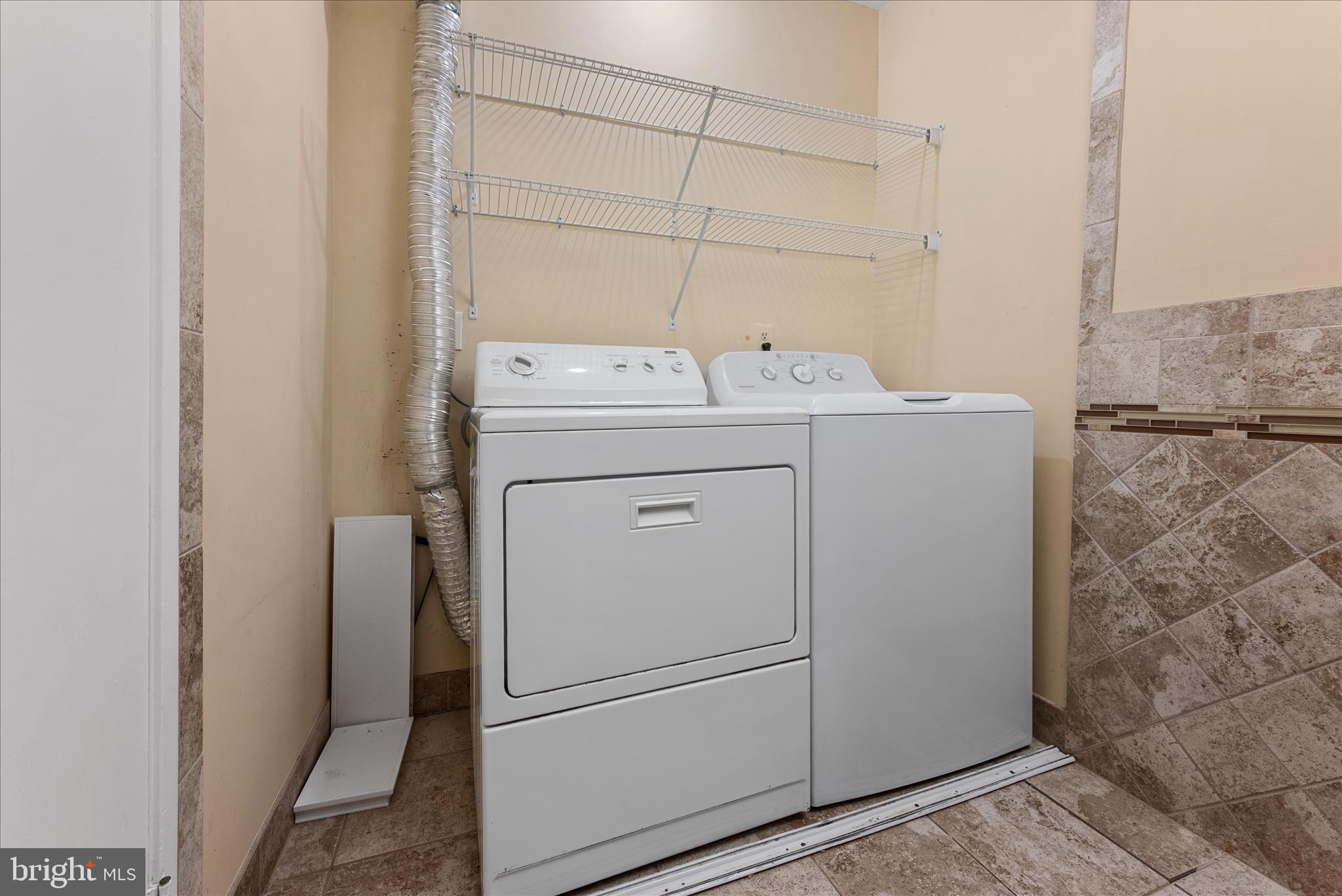 2337 Glade Bank Way Reston, VA 20191 - Photo 39 of 50 a utility room with dryer and washer