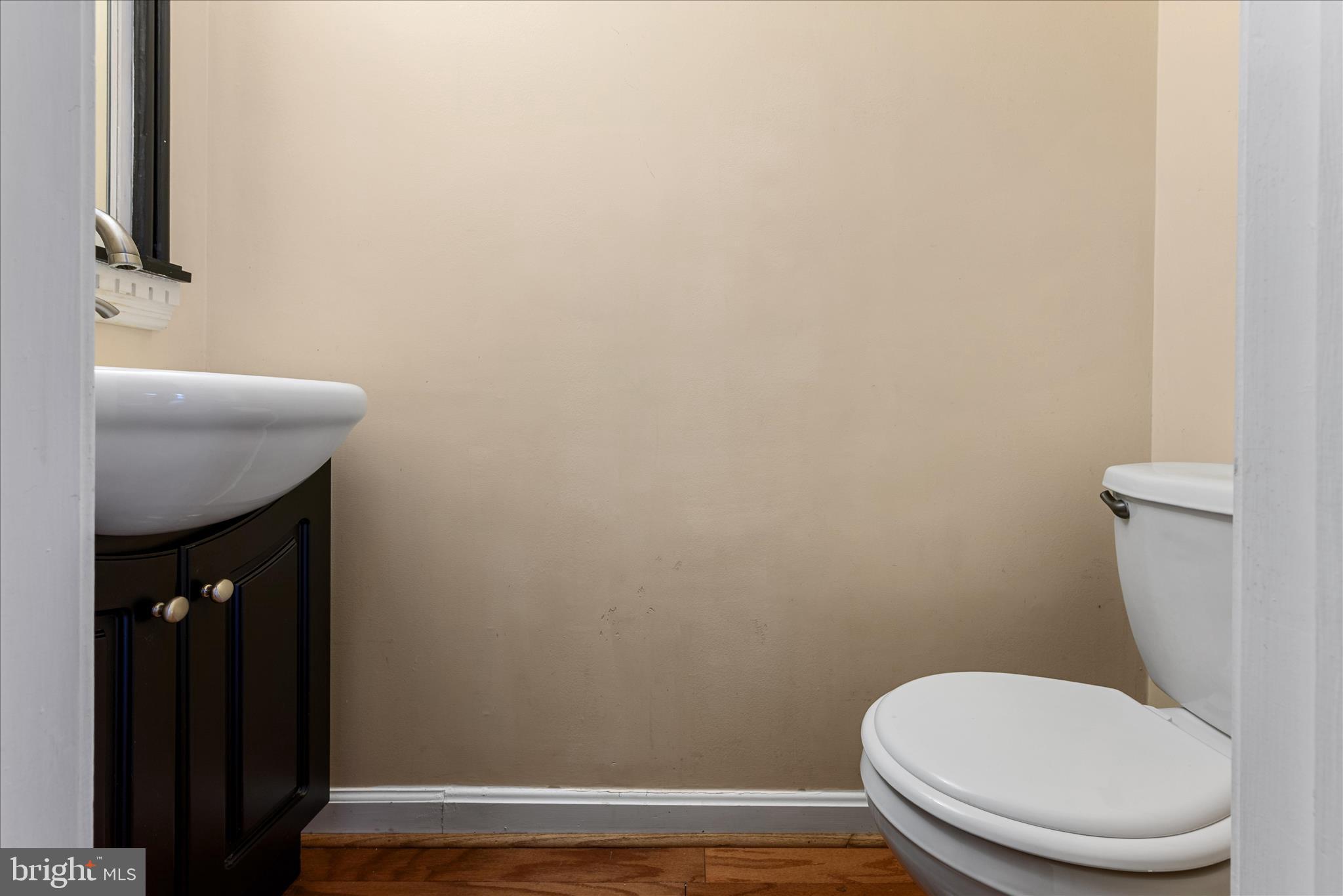 2337 Glade Bank Way Reston, VA 20191 - Photo 7 of 50 a white toilet sitting next to a white sink