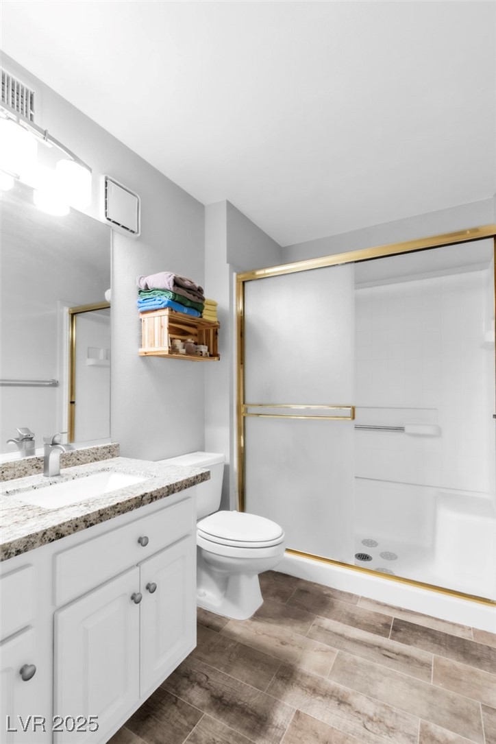2995 East Sunset Road, Unit 235 Las Vegas, NV 89120 - Photo 14 of 24 Full bath featuring vanity and a stall shower