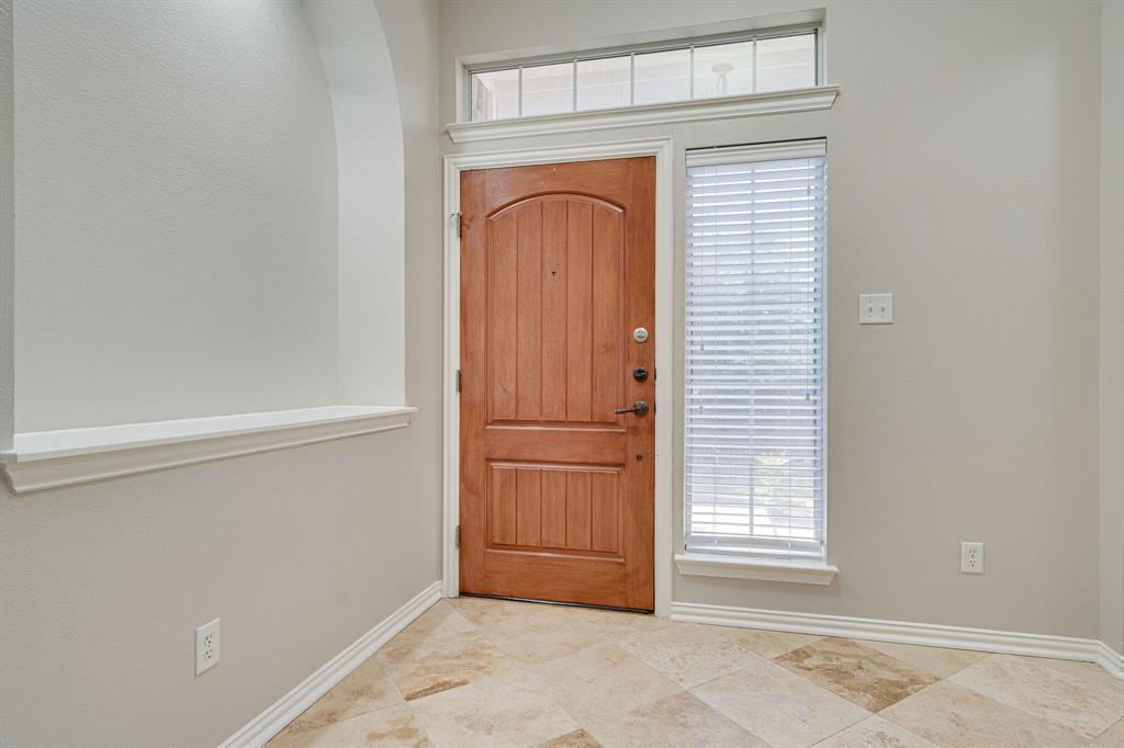 Foyer with beautiful Travertine tile.