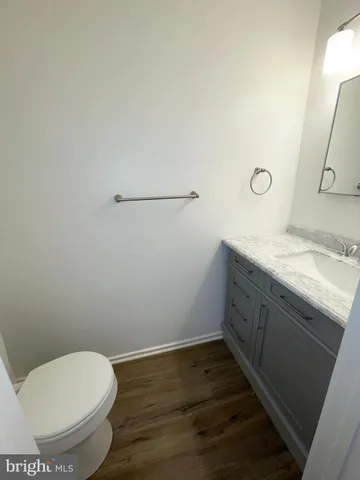 a view of an empty room with a fireplace