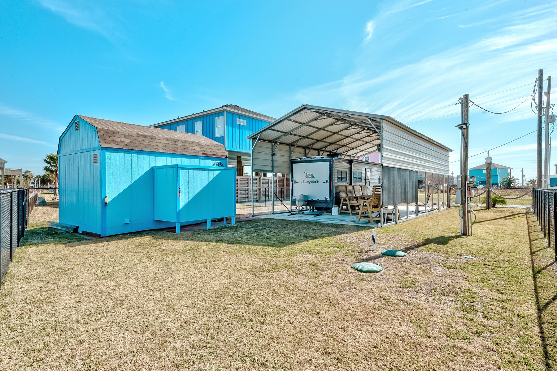 1765 Croaker Lane Crystal Beach, TX 77650 - Photo 13 of 17 a view of a house with backyard and porch