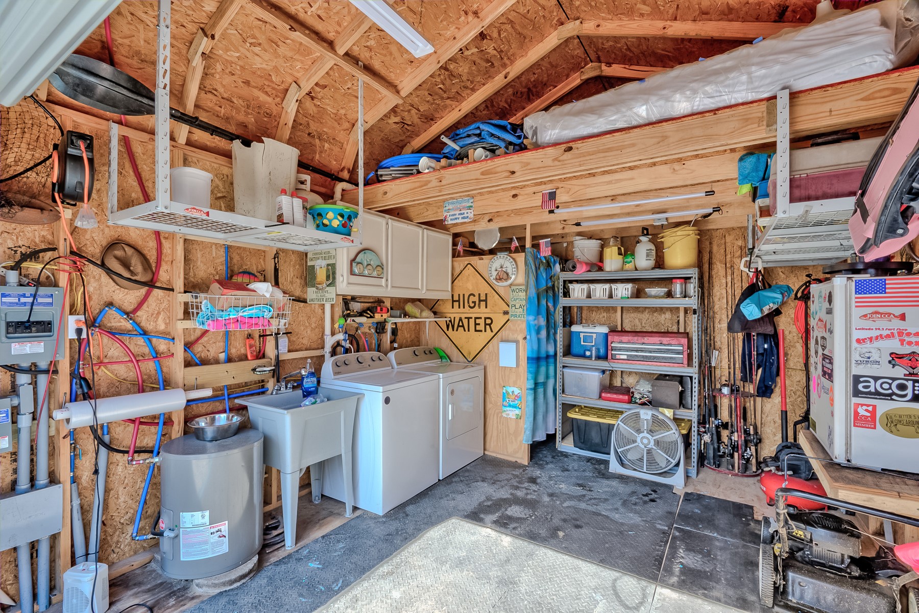 1765 Croaker Lane Crystal Beach, TX 77650 - Photo 14 of 17 a view of storage and utility room