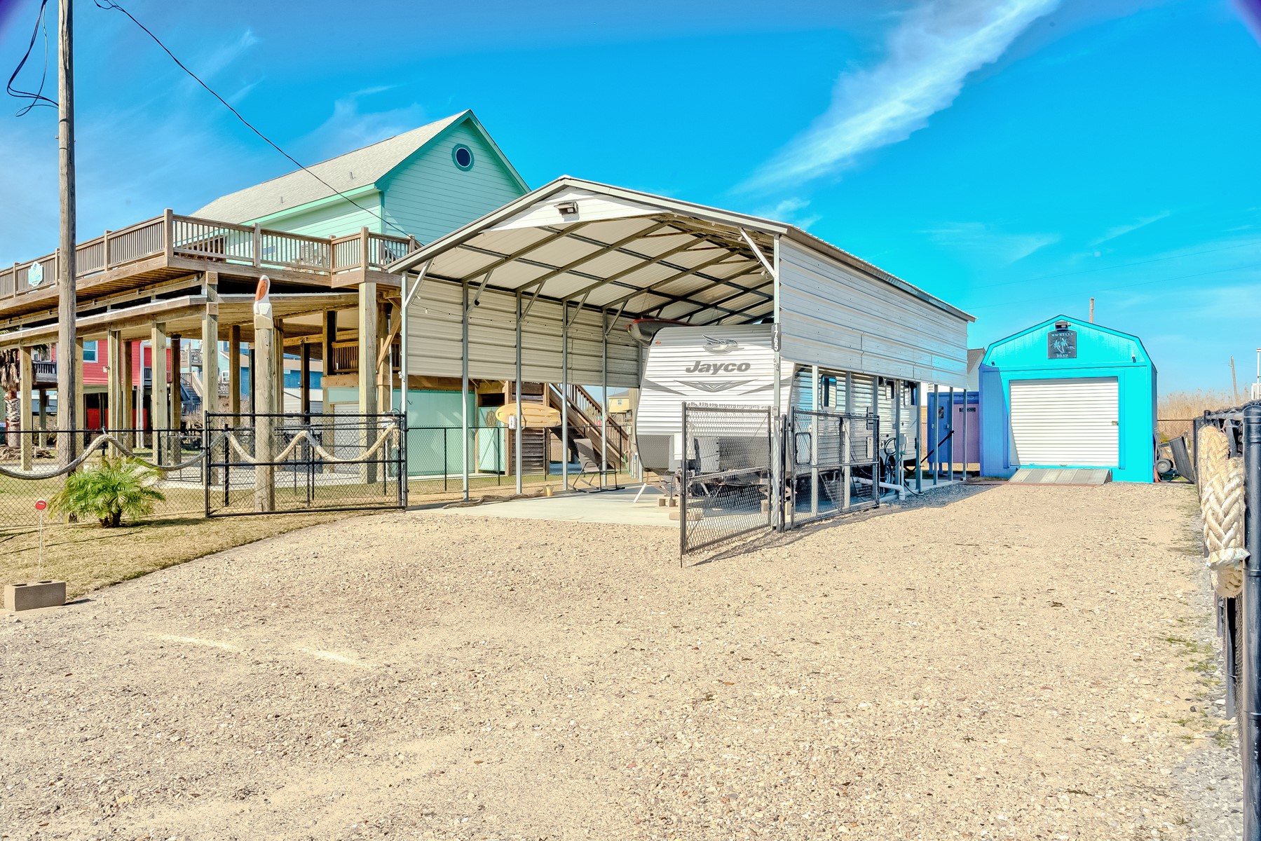 1765 Croaker Lane Crystal Beach, TX 77650 - Photo 4 of 17 a view of a house with a patio