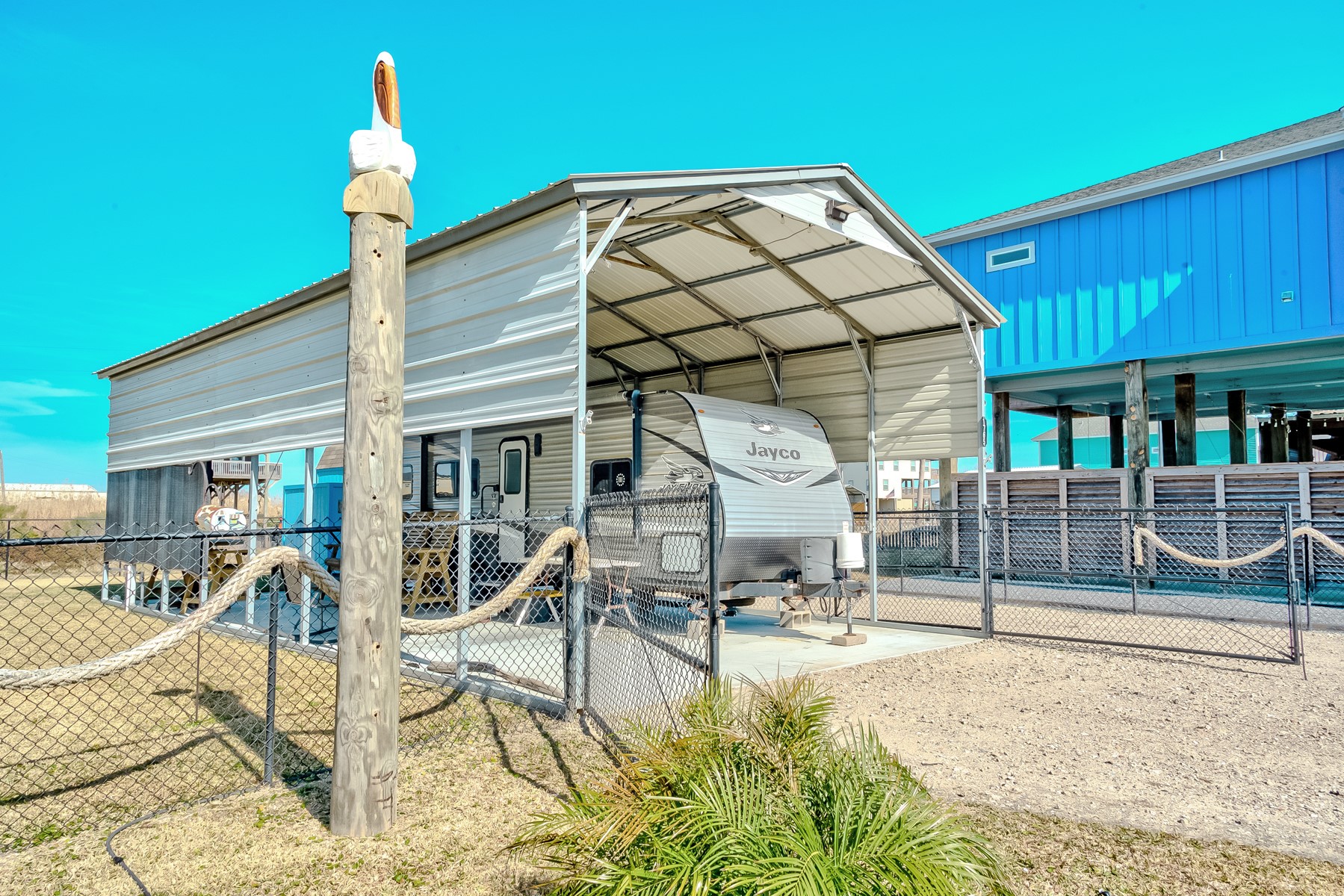1765 Croaker Lane Crystal Beach, TX 77650 - Photo 5 of 17 a view of a house with backyard