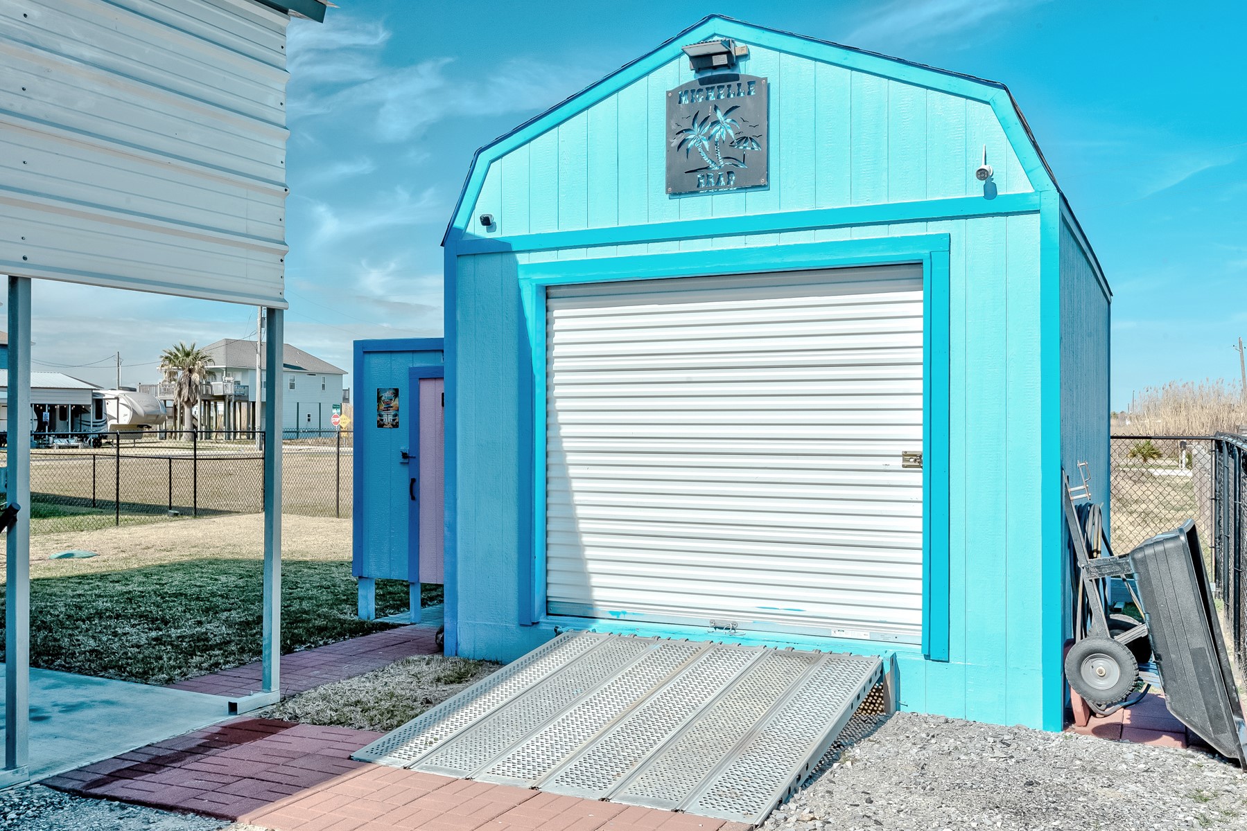 1765 Croaker Lane Crystal Beach, TX 77650 - Photo 9 of 17 a front view of a house with garden