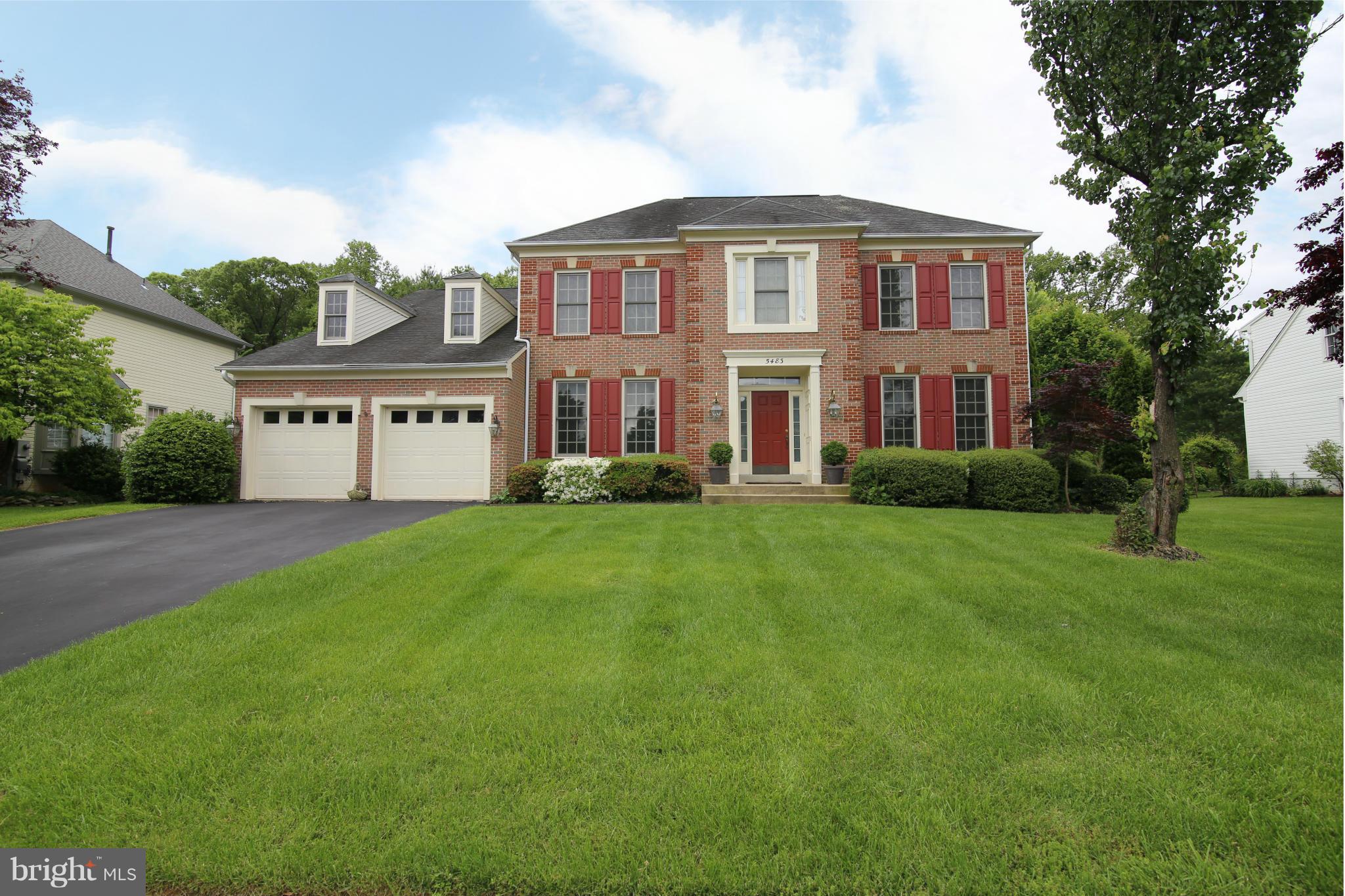 5483 Ashleigh Road Fairfax, VA 22030 - Photo 1 of 30 a front view of a house with a yard