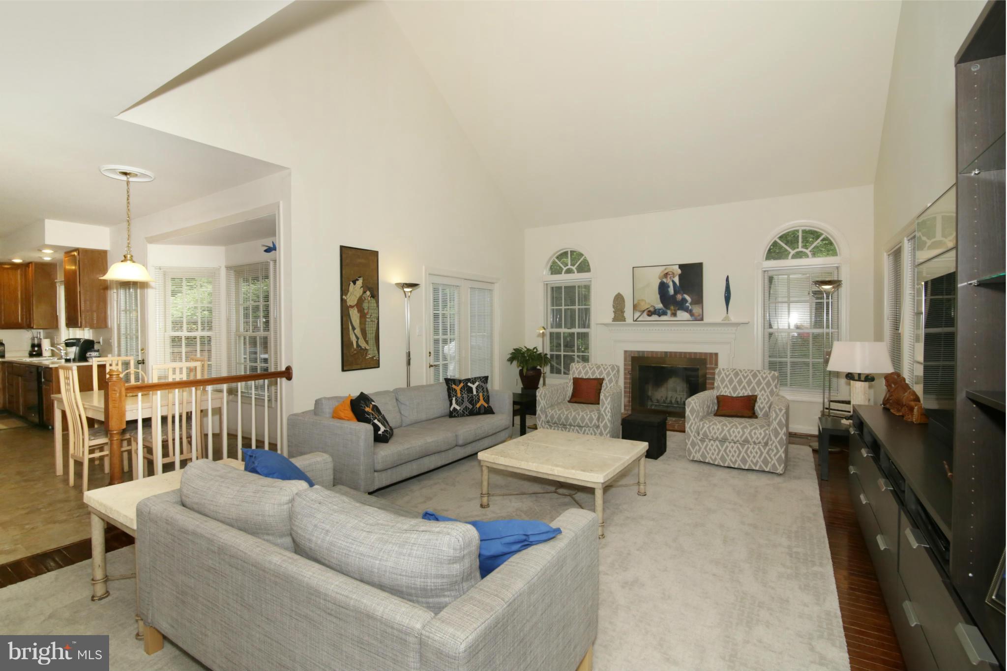 5483 Ashleigh Road Fairfax, VA 22030 - Photo 11 of 30 a living room with fireplace furniture and a flat screen tv
