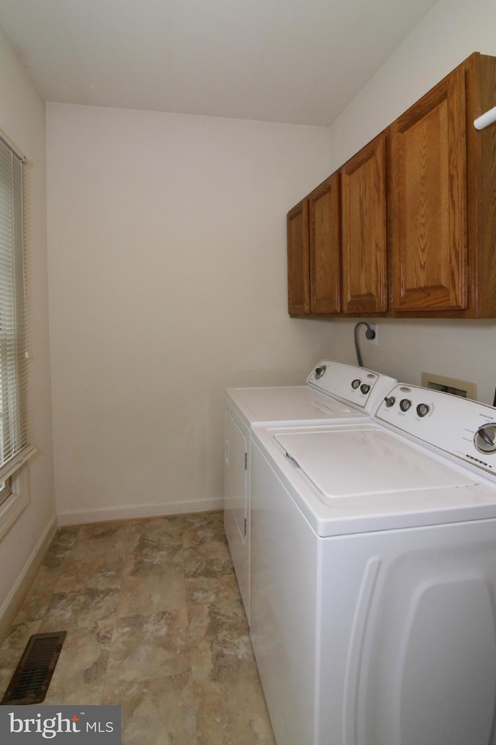 5483 Ashleigh Road Fairfax, VA 22030 - Photo 15 of 30 a utility room with a sink washer and dryer