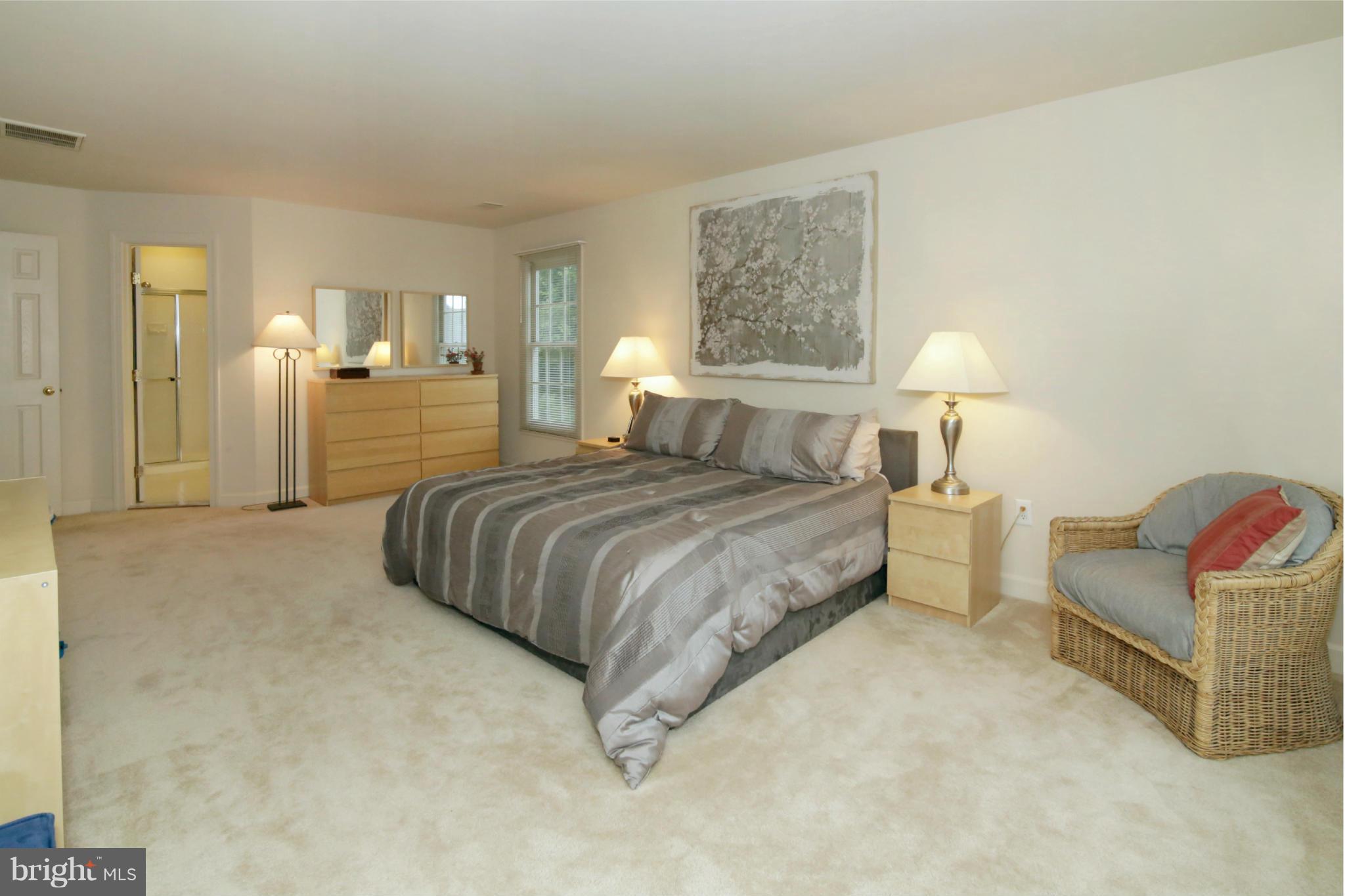 5483 Ashleigh Road Fairfax, VA 22030 - Photo 16 of 30 a bedroom with a bed and a couch