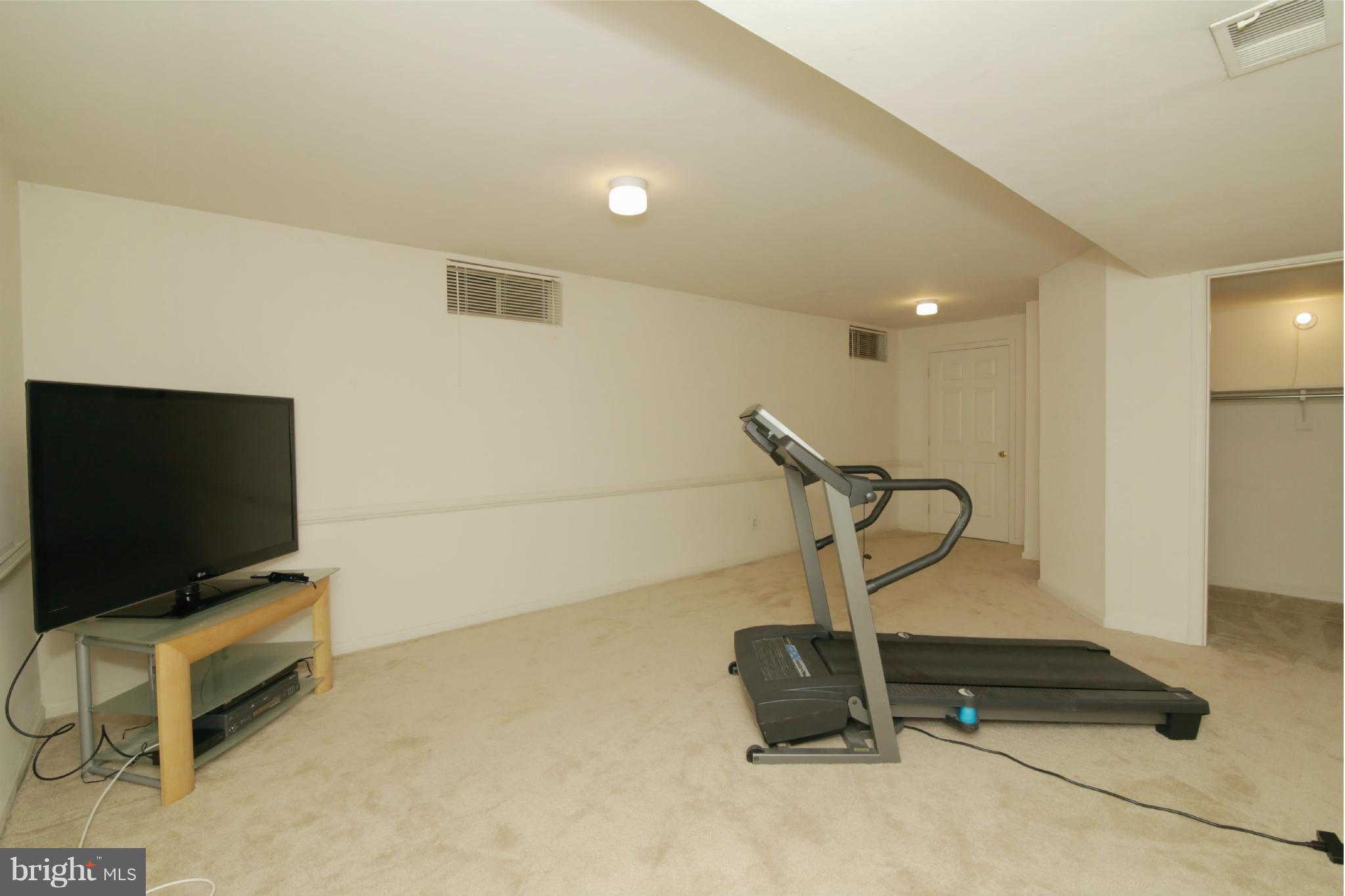 5483 Ashleigh Road Fairfax, VA 22030 - Photo 25 of 30 a view of a room with gym equipment