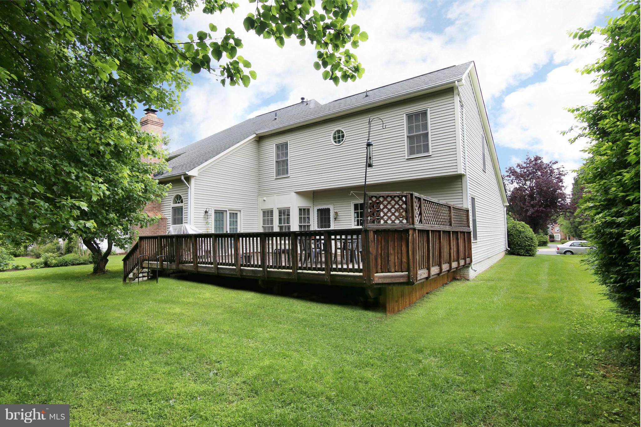 5483 Ashleigh Road Fairfax, VA 22030 - Photo 30 of 30 a view of a house with a yard and furniture