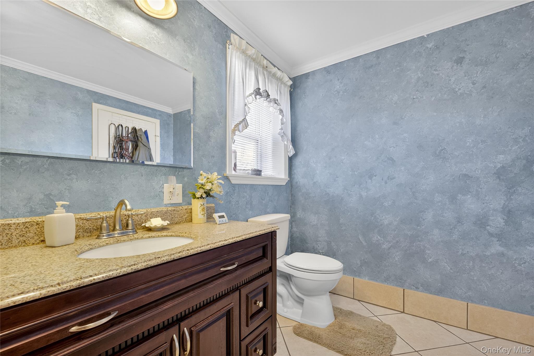 99 Dusinberre Road Gardiner, NY 12525 - Photo 10 of 24 a bathroom with a granite countertop sink a toilet and a mirror