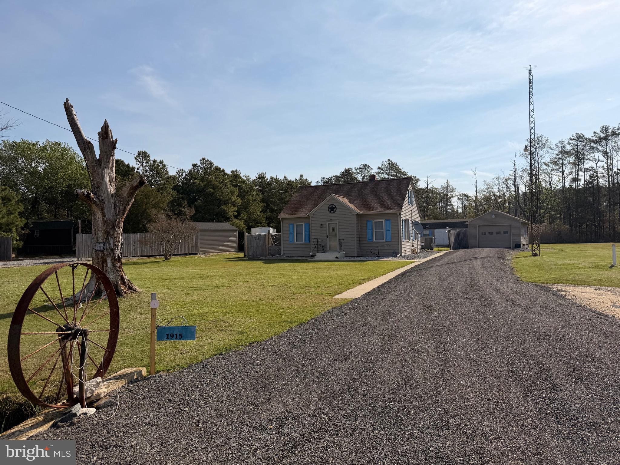 1915 Bishops Head Road Toddville, MD 21672 - Photo 3 of 15 a view of swimming pool with a yard and palm trees
