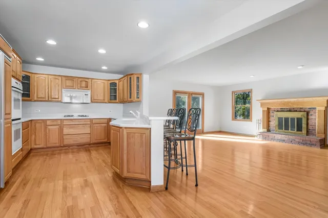 a kitchen with a sink and wooden cabinets