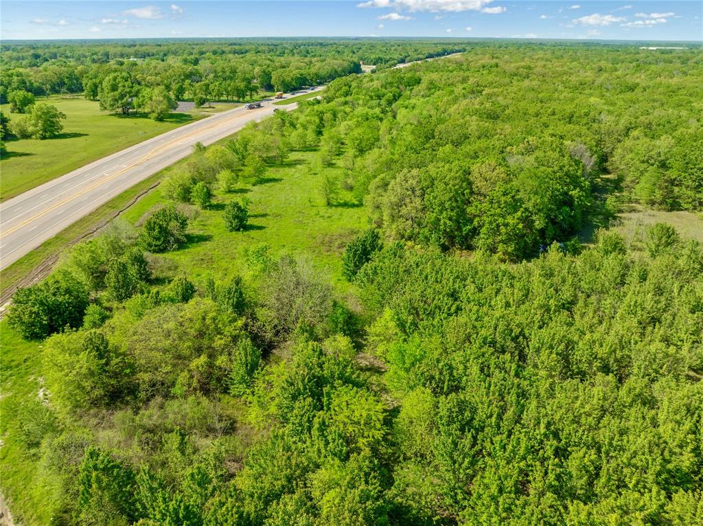 286 Southwest Loop 286 Paris, TX 75460 - Photo 16 of 17 a view of a lush green field