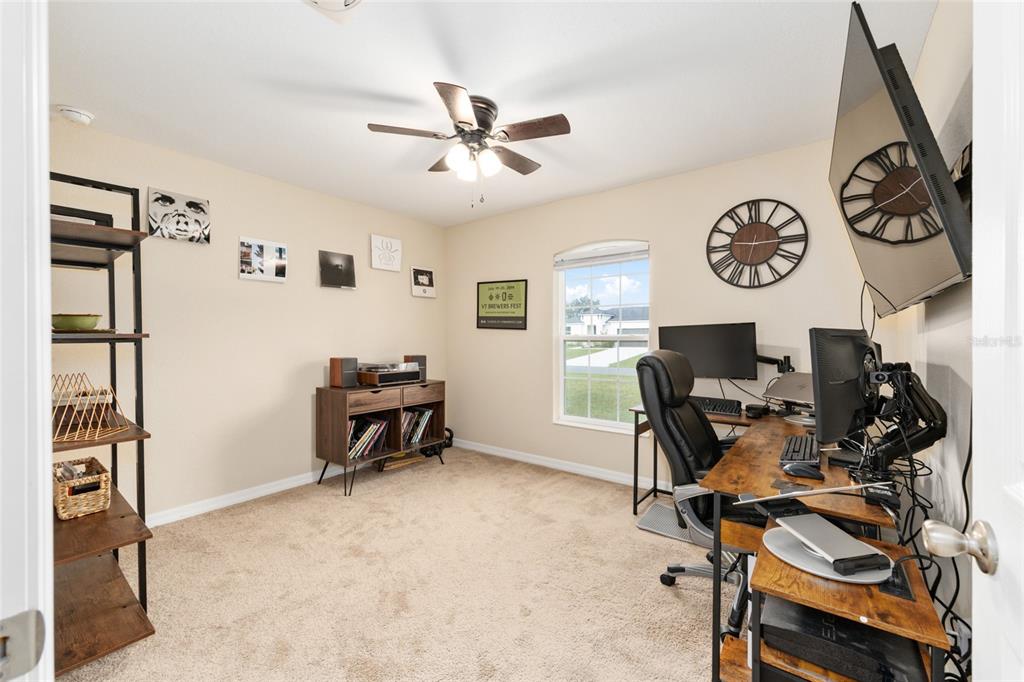 16779 Southwest 17th Avenue Ocala, FL 34473 - Photo 18 of 34 a view of a workspace with furniture and a window
