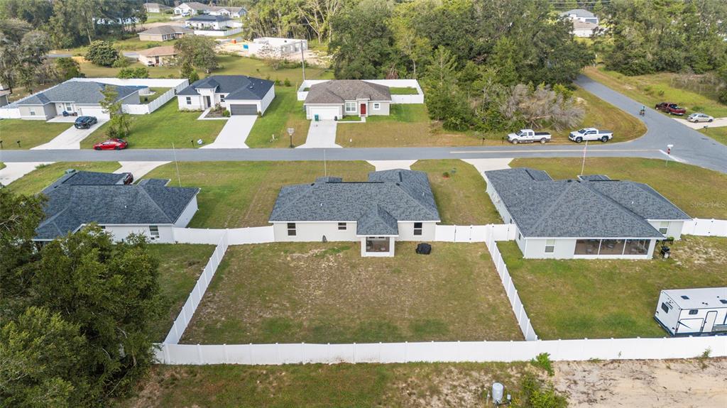 16779 Southwest 17th Avenue Ocala, FL 34473 - Photo 33 of 34 an aerial view of houses with yard