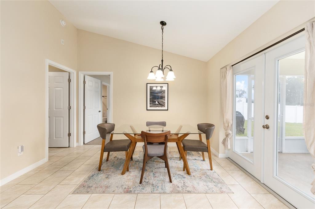16779 Southwest 17th Avenue Ocala, FL 34473 - Photo 8 of 34 a dining room with furniture and window