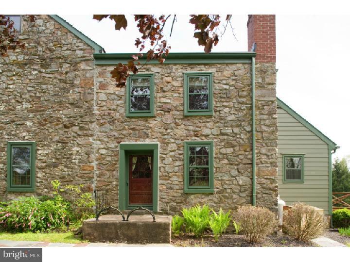 3050 Cooks Creek Road Riegelsville, PA 18077 - Photo 15 of 25 a view of a brick house with a large windows