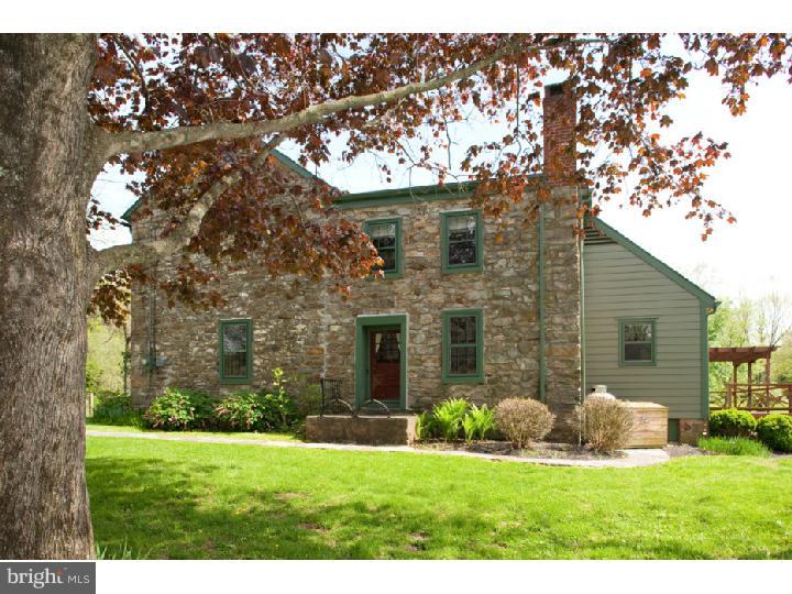 3050 Cooks Creek Road Riegelsville, PA 18077 - Photo 16 of 25 a view of a house with a yard