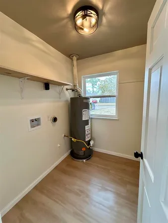a room with window and a ceiling fan