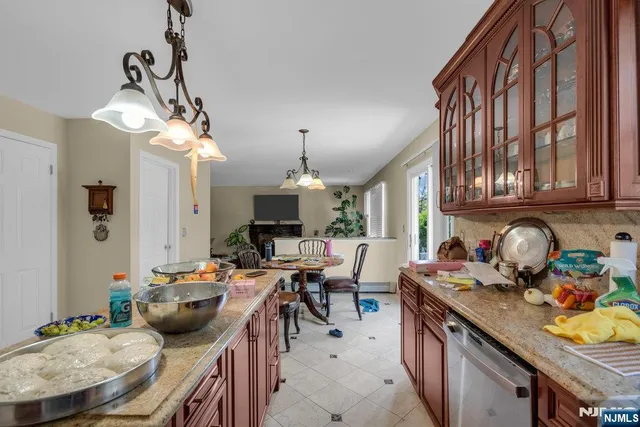 a kitchen with granite countertop lots of counter top space