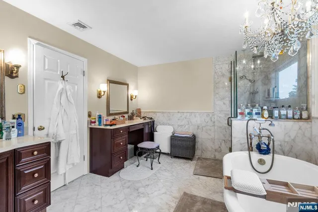 a room with furniture and a chandelier