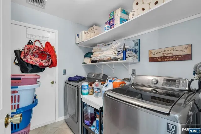 a kitchen with a stove and cabinets