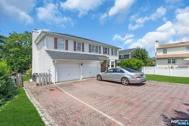 a view of street with parked cars