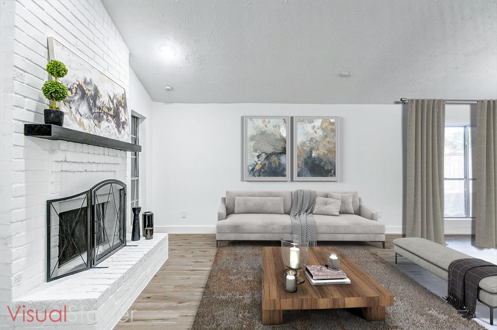 Spacious living are with fireplace (Virtually Staged)