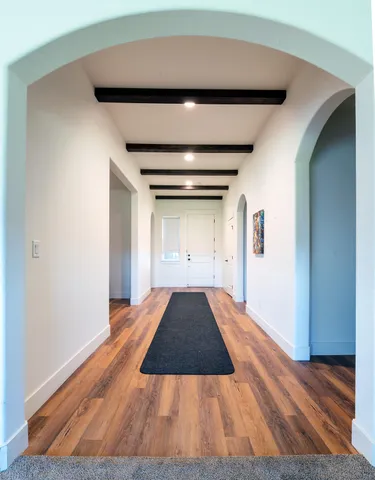 a living room with furniture fireplace and a flat screen tv