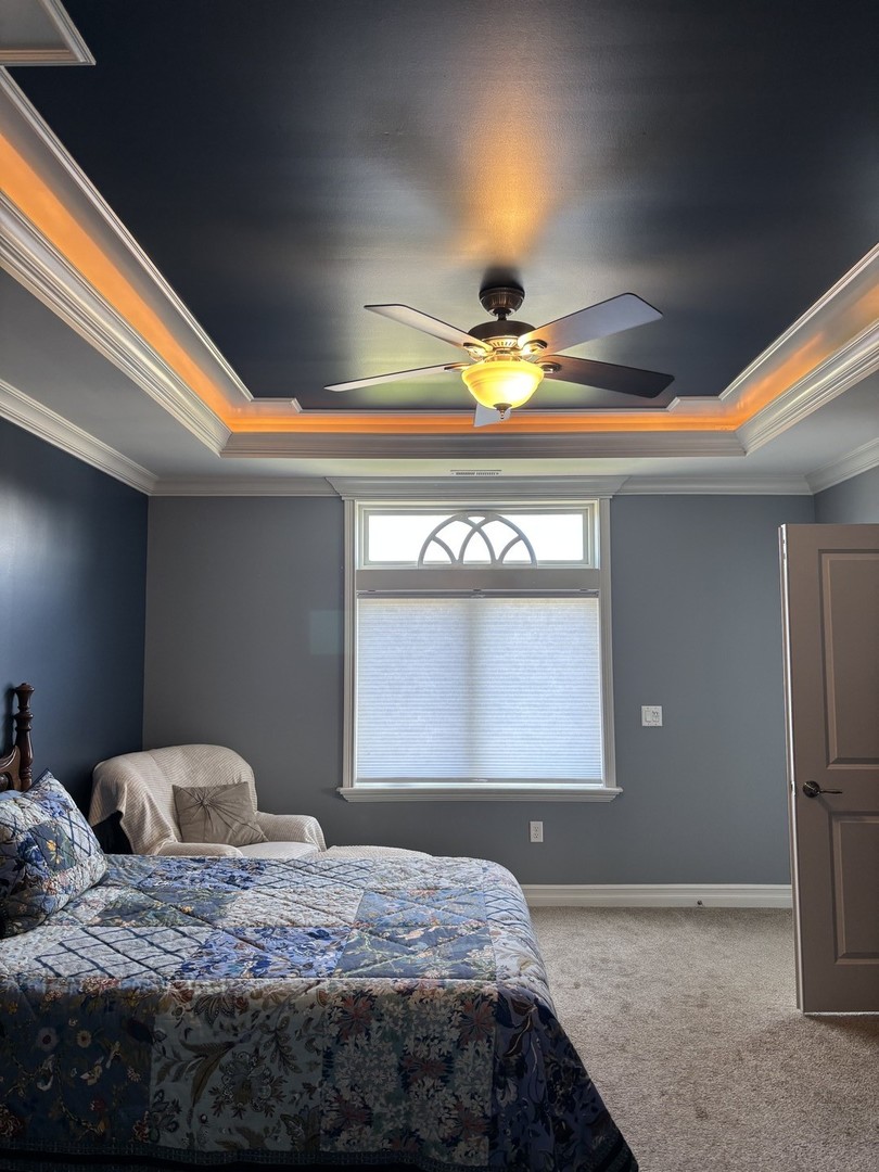 408 Stearn Drive, Unit 408 Genoa, IL 60135 - Photo 12 of 34 a bedroom with a bed and a window