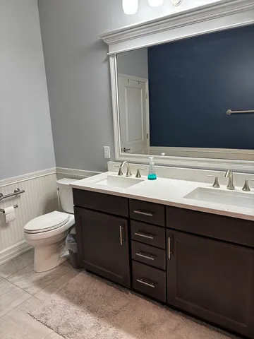 a bathroom with a sink and a toilet