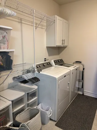 a kitchen with a stove a sink and a refrigerator