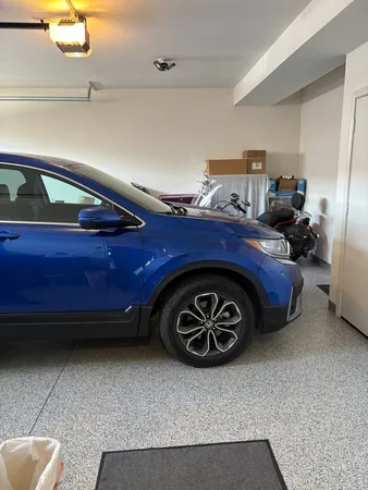 a view of street with a car parked