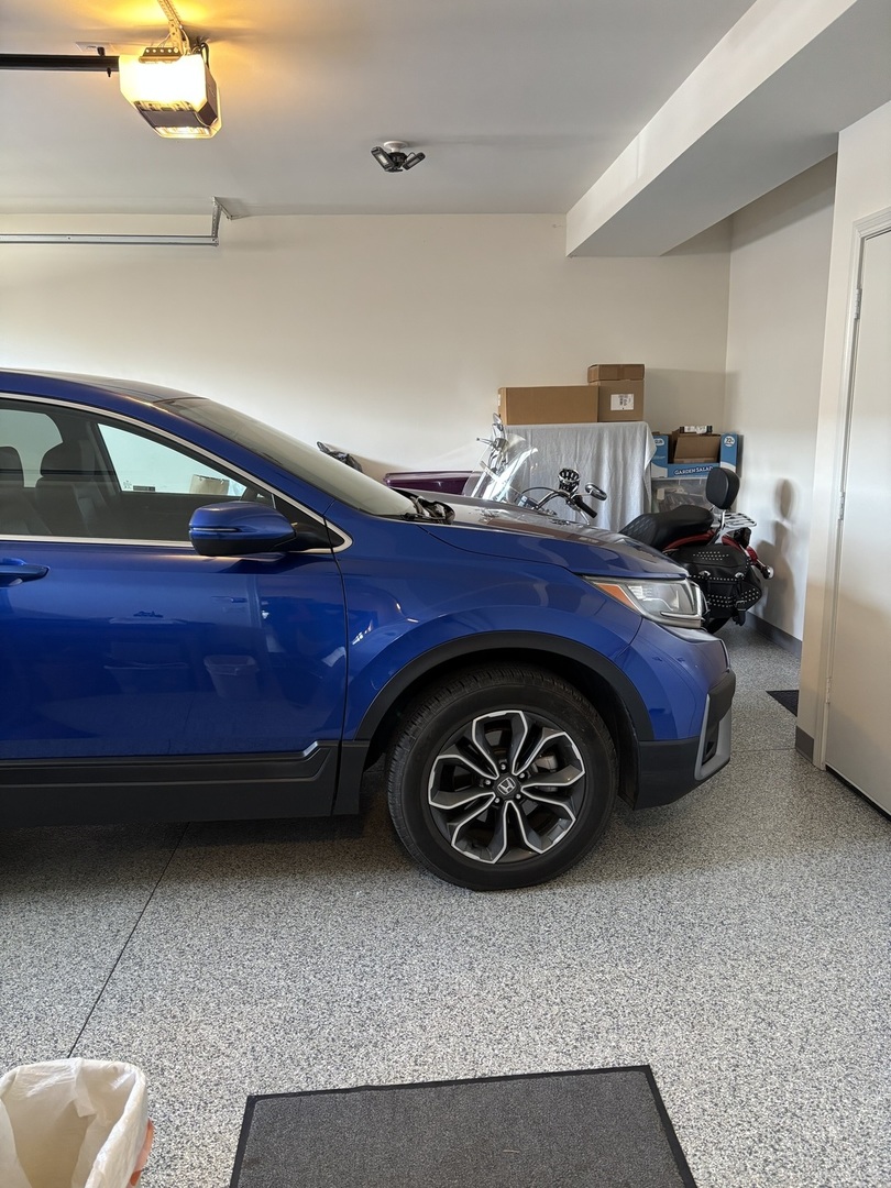 408 Stearn Drive, Unit 408 Genoa, IL 60135 - Photo 25 of 34 a view of car garage
