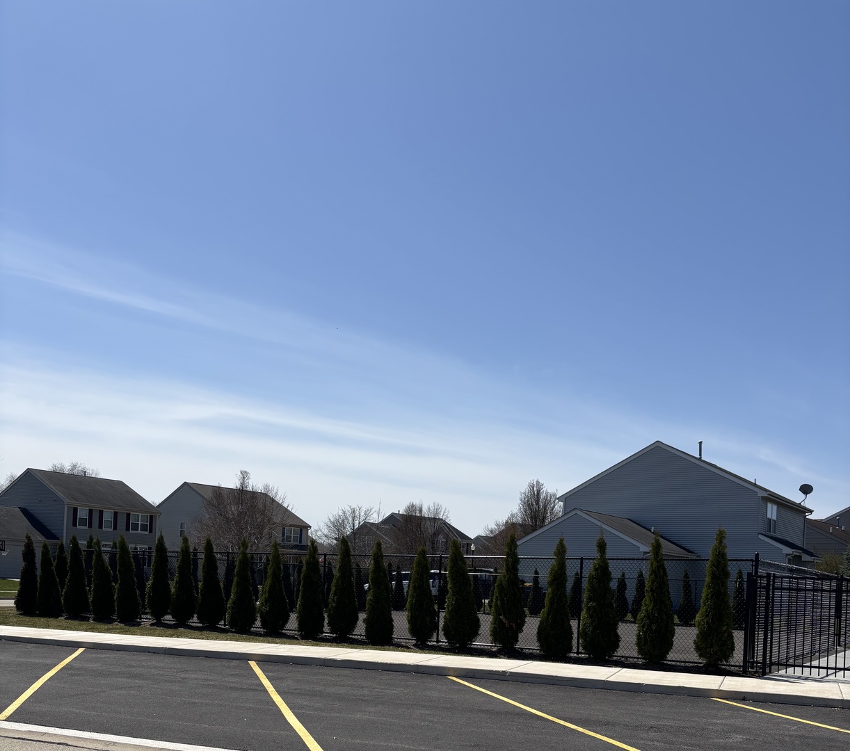 408 Stearn Drive, Unit 408 Genoa, IL 60135 - Photo 27 of 34 a view of street with a car parked