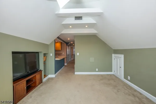 a view of a hallway with an empty room
