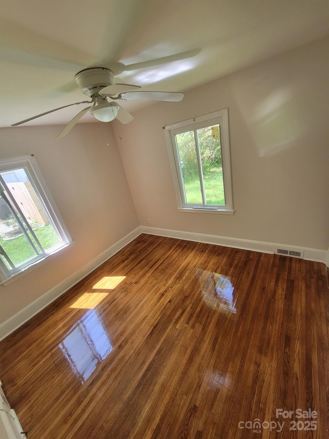 1733 Merry Oaks Road Charlotte, NC 28205 - Photo 2 of 11 a view of an empty room and window
