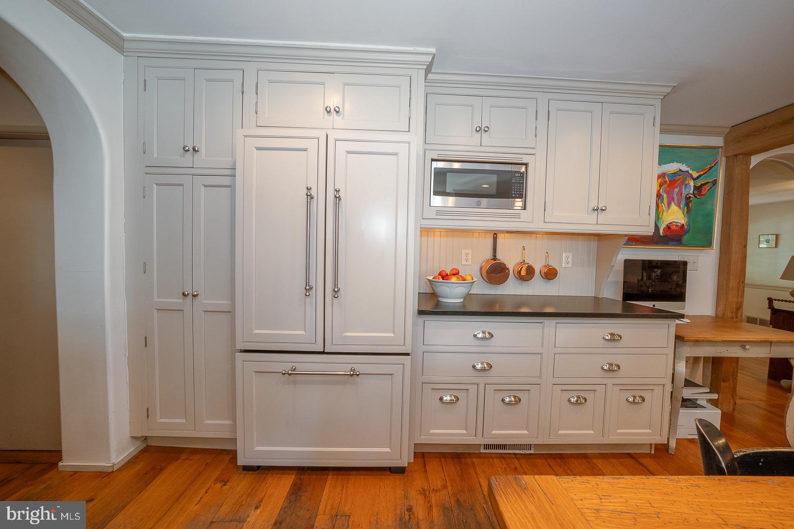 395 Bair Road Berwyn, PA 19312 - Photo 11 of 51 a kitchen with stainless steel appliances granite countertop a refrigerator and a stove top oven