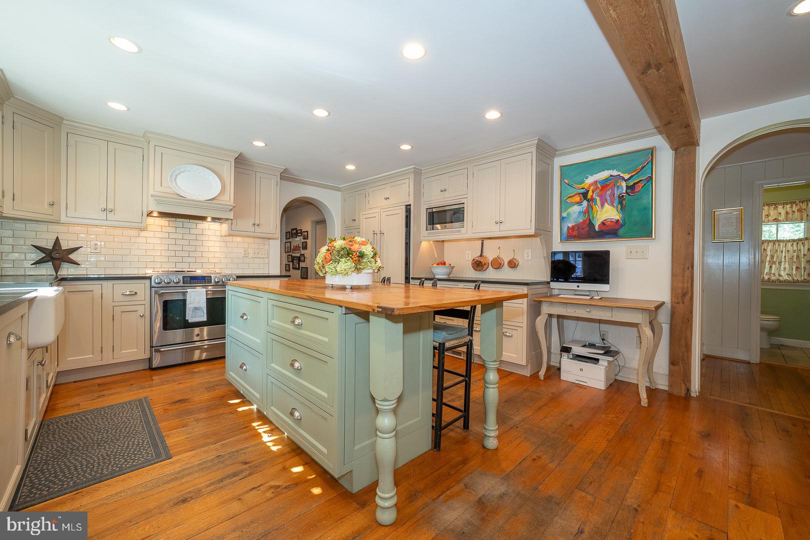 395 Bair Road Berwyn, PA 19312 - Photo 12 of 51 a kitchen with a sink cabinets and wooden floor