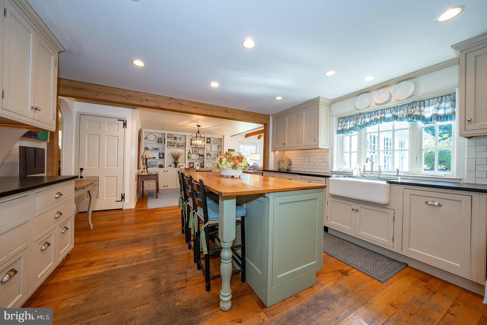 395 Bair Road Berwyn, PA 19312 - Photo 13 of 51 a kitchen with stainless steel appliances granite countertop a sink and a refrigerator