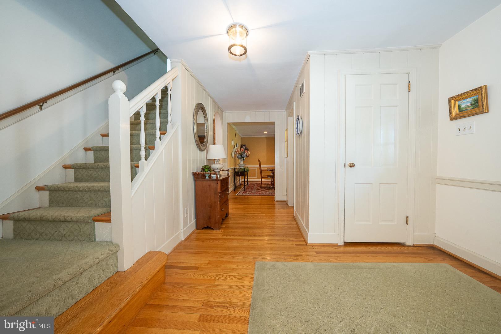 395 Bair Road Berwyn, PA 19312 - Photo 25 of 51 a view of a hallway view with wooden floor and staircase