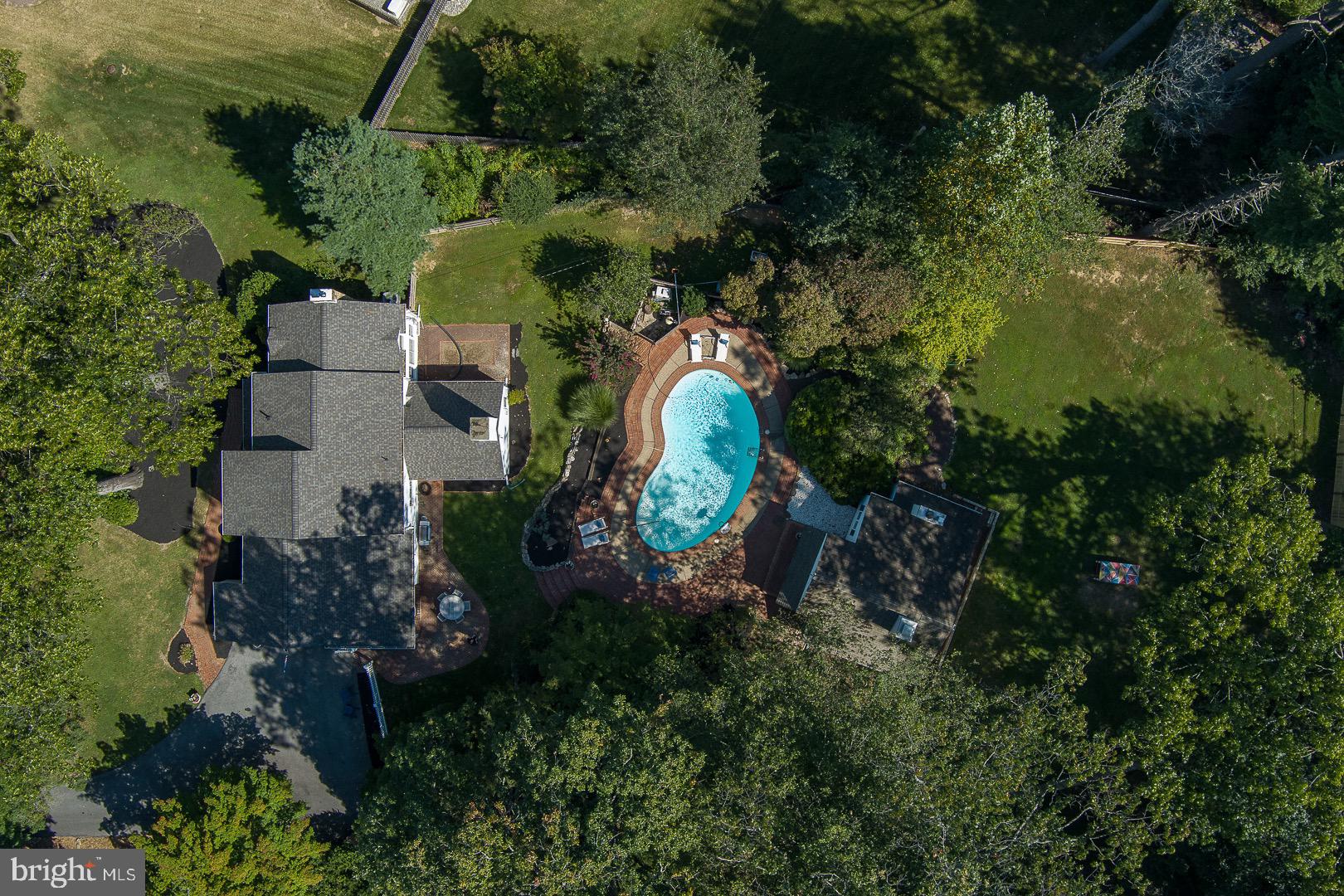 395 Bair Road Berwyn, PA 19312 - Photo 48 of 51 an aerial view of a house with a swimming pool
